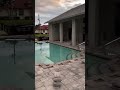 1990's SW FL home with UGLY stamped concrete pool deck gets paver update.