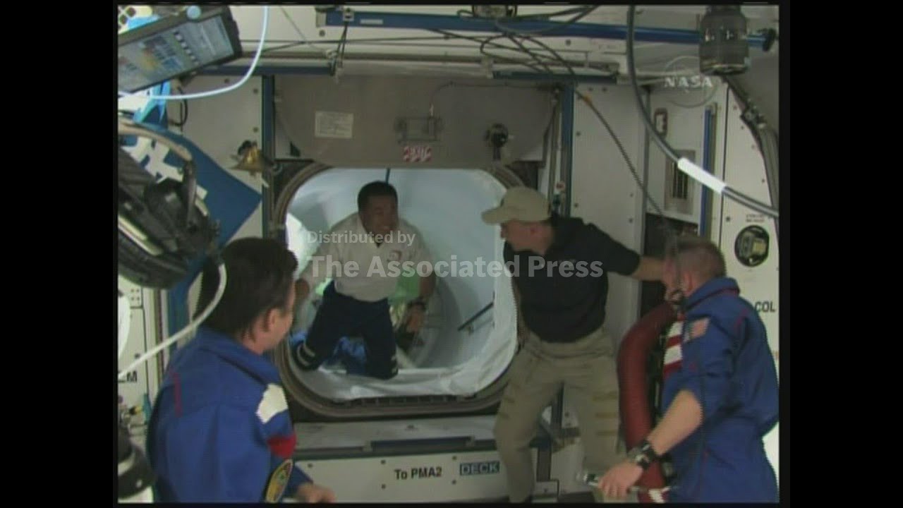 Space shuttle Discovery arrives at international space station