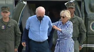 Biden struggles to put jacket on, requires Jill to help him