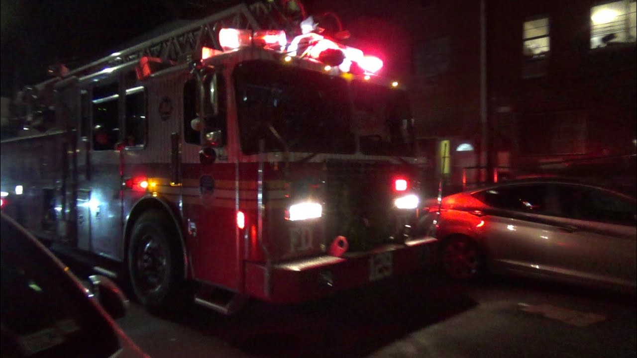 FDNY Ladder 129 taking up after a class 3 alarm - YouTube