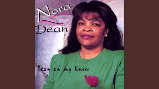 Video thumbnail of "Nora Dean - Down On My Knees"