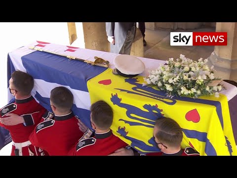 Prince Philip's coffin carried out of Windsor Castle