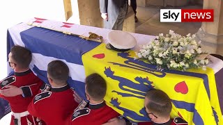 Prince Philip's coffin carried out of Windsor Castle