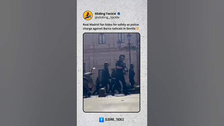 Real Madrid fan hides for safety as police charge against Barca radicals in Sevilla 😳😳 #barcelona