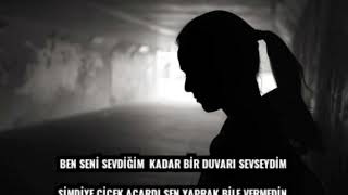 BEN SENİ  SEVDİĞİM KADAR BİR DUVARI SEVSEYDİM SİMDİYE ÇİÇEK AÇARDI SEN YAPRAK BİLE VERMEDİN.