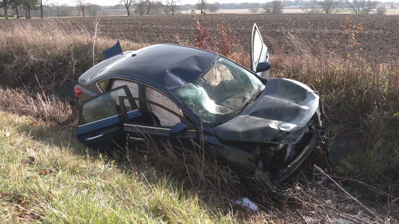 Car crashes into ditch, starts on fire near Cherryvale Mall - YouTube