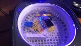 Ultrasonic cleaning is a process that uses ultrasound (usually from
20–400 khz) and an appropriate solvent (sometimes ordinary tap
water) to clean i...