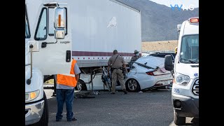 Driver trapped in vehicle after crashing under semi trailer in Victorville