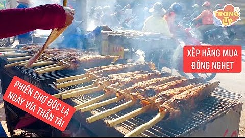 Sài Gòn ngày vía Thần Tài ở khu chợ cá lóc nướng trui tấp nập, người dân xếp hàng mua đông nghẹt!