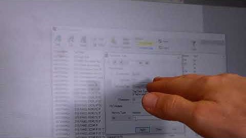 PLC/HMI system monitoring an analog voltage