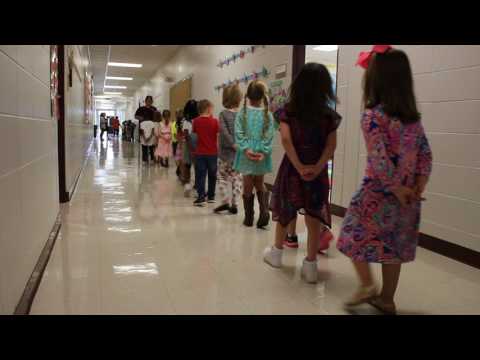 Dewar Elementary School kids walk the halls on the first day of school.