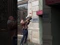 Man Uses Backpack to Rescue Stranded Cat From Ledge