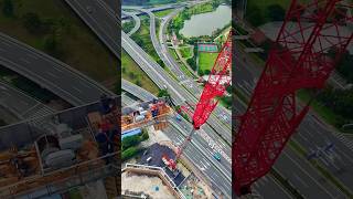 Workers on a 100 meter tower crane #technology #infrastructure #scenichighway #crane Workers on a 100 meter tower crane #technology #infrastructure #scenichighway #crane