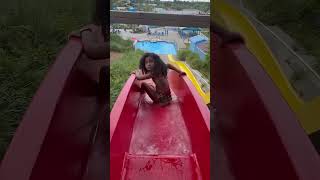 Watch Scarlett go down the water slide! 💦#summer #waterslide #shorts