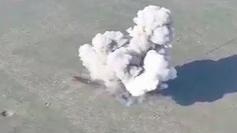 A Ukrainian UR-77 "Meteorit" Mine Clearing Line Charge clears a field laid with Russian mines