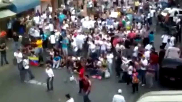 GNB (Bolivarian National Guard) of Venezuela violently attacks peaceful protesters