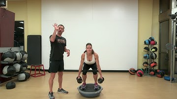 Squat, Bicep Curl And Shoulder Press On A Bosu Ball.
