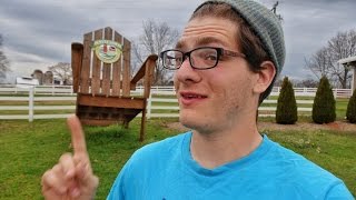 Dam Thats a Big Adirondack Chair their is a Giant Adirondack chair sitting in the middle of nowhere and a dam with a beautiful river . Showing me a beautiful sight ...