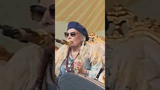 Oh yeah! Joni Mitchell grooving at Newport Folk Festival.