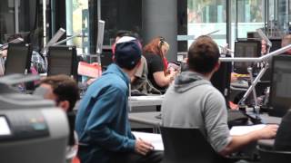 Guy Uses Typewriter in College Library