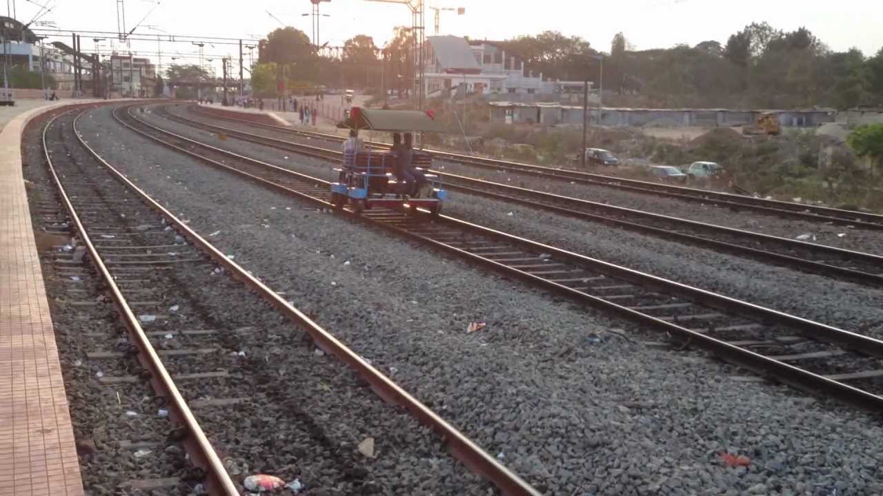 INDIAN RAILWAYS Motorized trolley whizzes past with inspection crew at BYPL, Bangalore