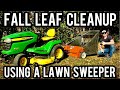 Fall leaf cleanup using a lawn sweeper