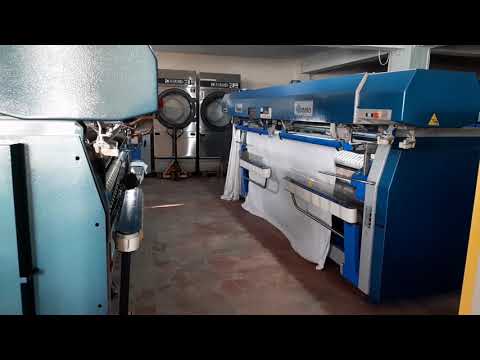Βίντεο: Πώς να επιλέξετε μια μηχανή σιδερώματος