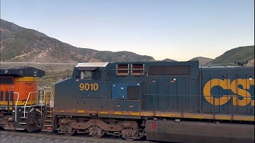 CSX 9010 dash-9 trails on eb intermodal up cajon pass + firefighting plane