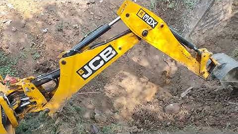 JCB Backhoe Machine Making Drain and Loading Soil in Tractor - JCB 3DX Working For Road Work