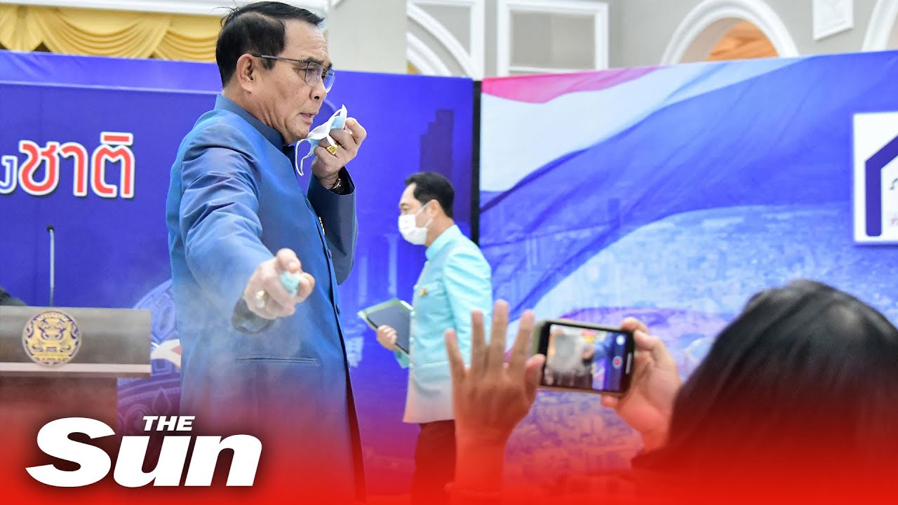 Thai PM sprays journalists with hand sanitiser after being asked about cabinet reshuffle