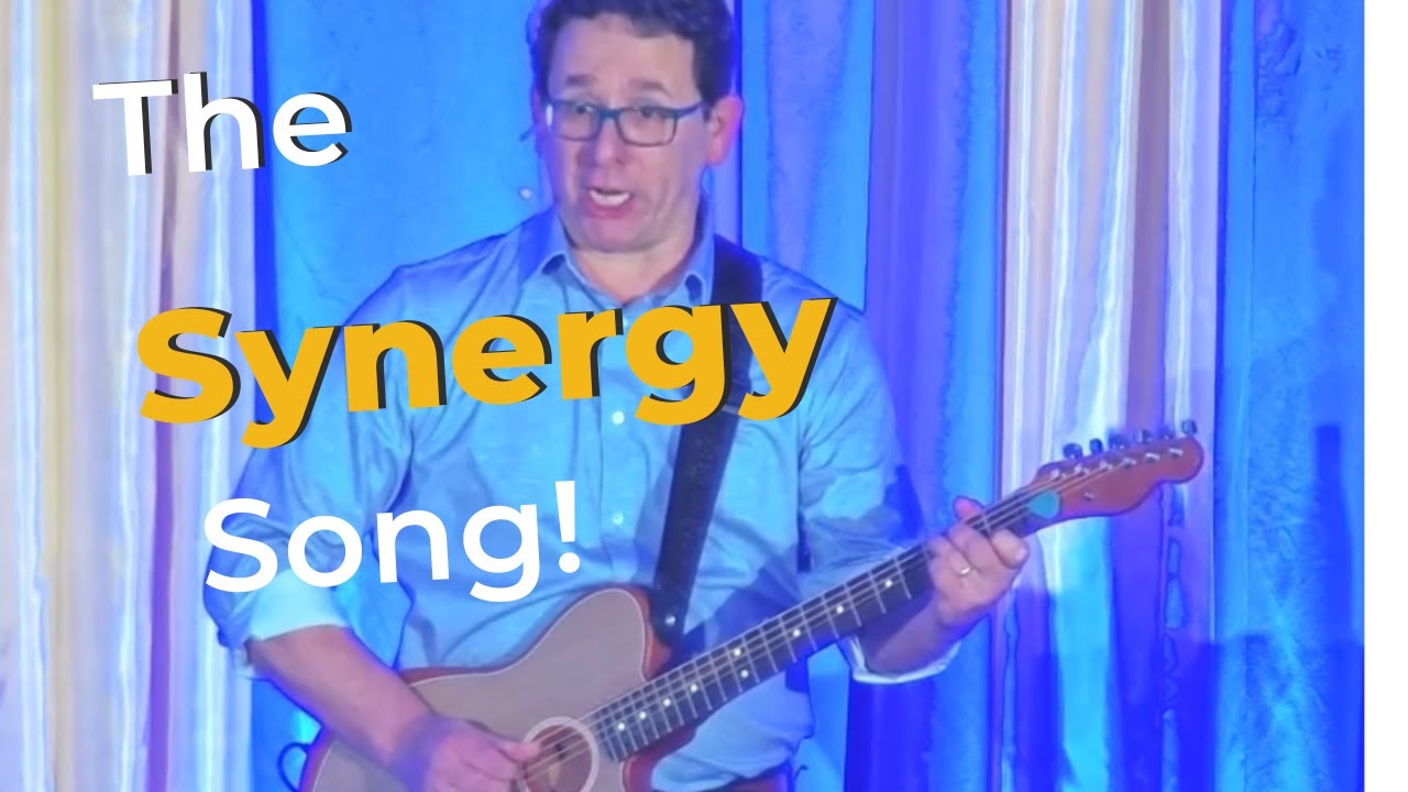 Turning Corporate Jargon into a Song! They Synergy Song by Rick Lozano -  * Musical Motivator