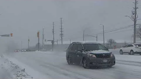 More Snow; Traffic Going By!
