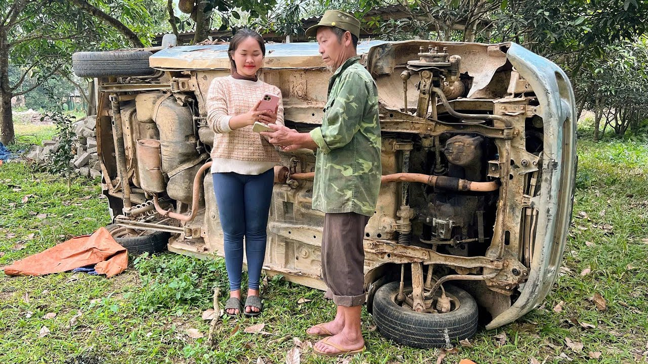 The genius girl successfully repaired the dilapidated, heavily damaged old car.