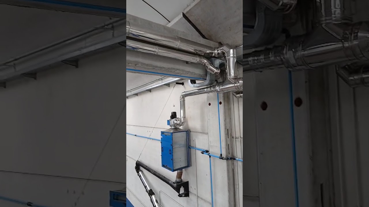 Aspirazione gas di scarico in officina a Pisa: l'impianto FM2 in funzione