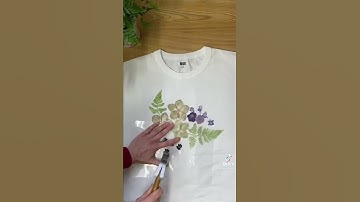 Eco print on a t-shirt. Hammered flowers