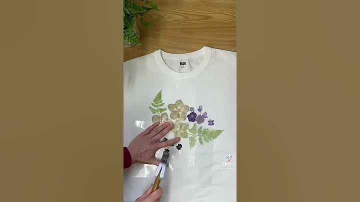 Eco print on a t-shirt. Hammered flowers