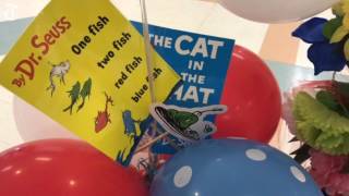 Volunteers share their favorite Dr. Seuss book with elementary students