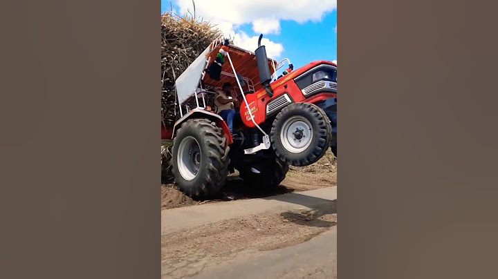 Mahindra Arjun Tractor heavy loaded sugarcane Trolley on Road entry STUNT ...