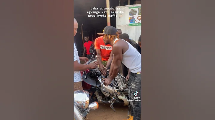 Alien Skin repairing his motorcycle himself