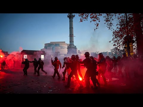 Tear gas and water cannons used across France as 130,000 protest new police security bill