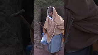 People coming out of the sacred tunnels in Lalibela Ethiopia shorts ethiopia lalibela