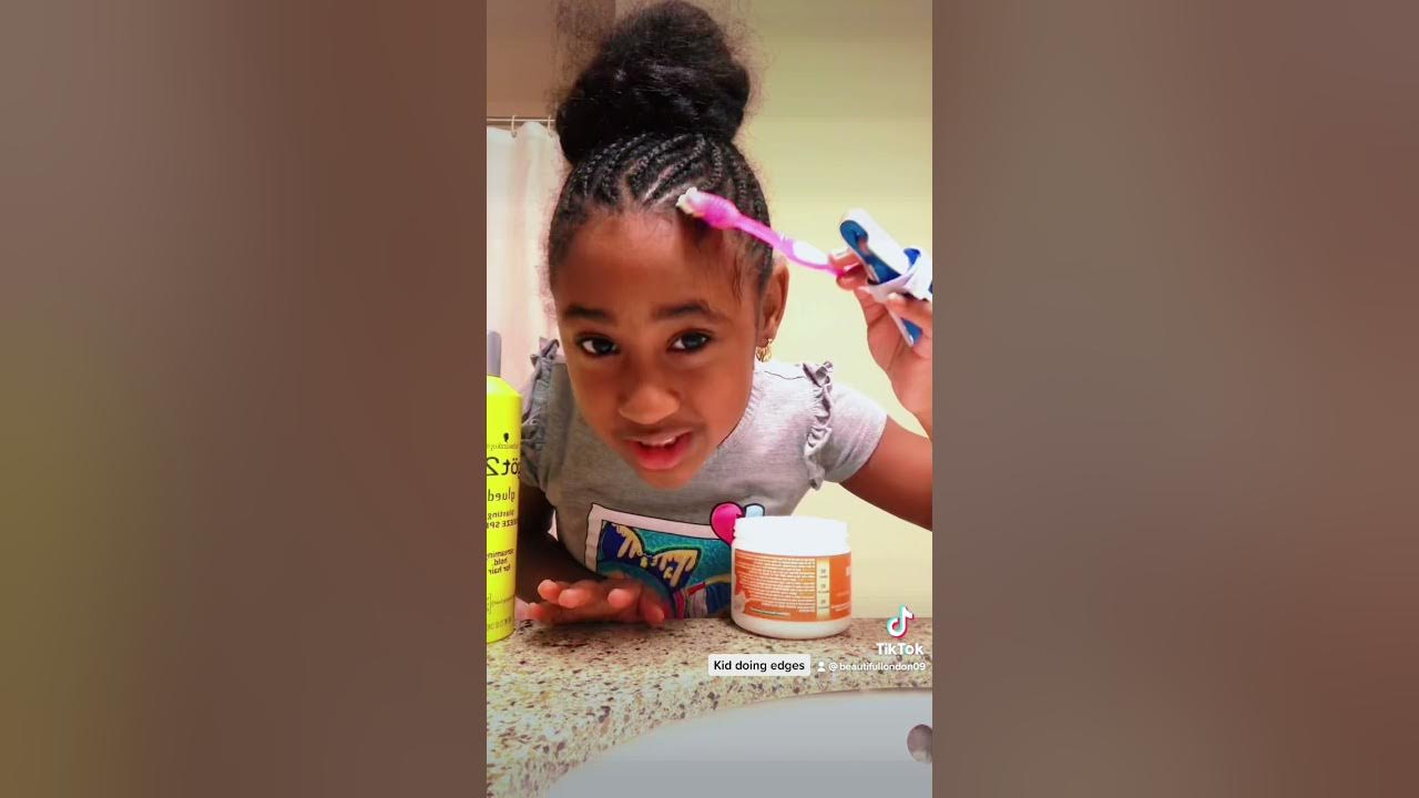 7 yr old kid doing hairstyle tutorial on how to do edges/baby hair