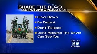 Use caution when approaching tractors on roadways