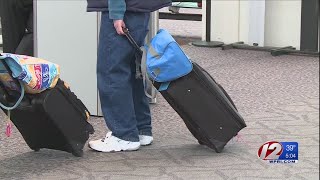 Long lines at TF Green, train stations as Thanksgiving travel rush continues