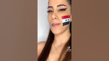 بنت ايراني ترسم علم سوريا عل وجهه عل تيك توك 