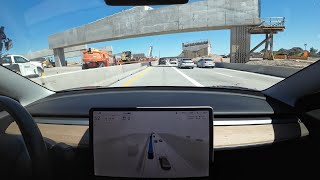 Tesla FSD 12.3.4 passes back across the construction on I-10