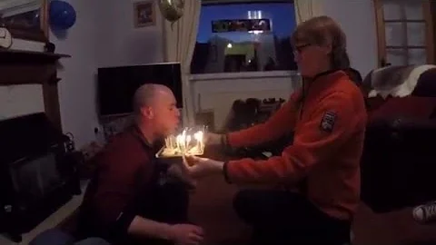 Jumping out of a box to surprise the boy on his 30th birthday