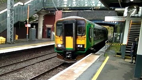 Two London Midlands Class 153 coupled with Class 170 Turbostar in rear halting at University station