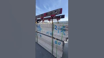 Granite slabs are being meticulously loaded into containers, and the affordability of sea freight