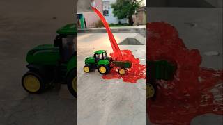 Green Money Tractor Per Red Colour Gira Diya